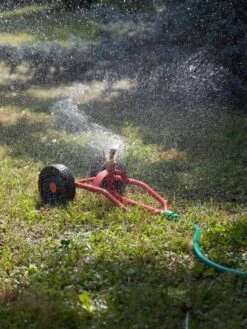 Wheeled Sprinkler Sled -Garden Supply Store 8610520 06V tif